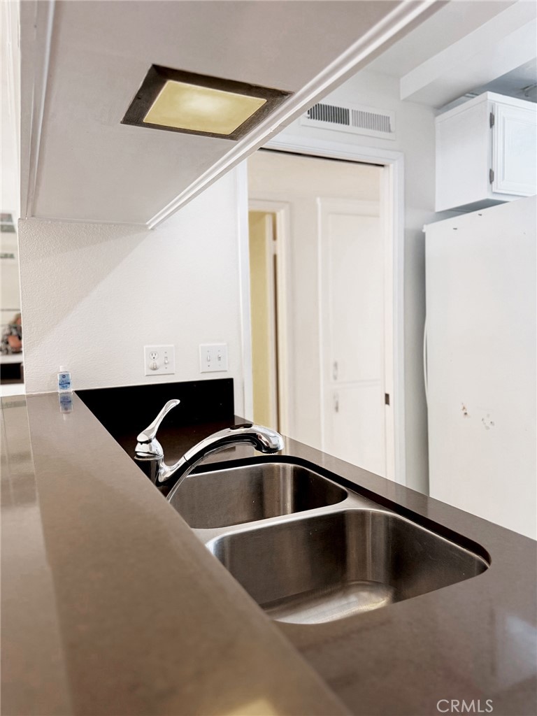 18419 Collins Street, Unit E Tarzana, CA 91356 - Photo 14 of 40 a close view of sink and tap
