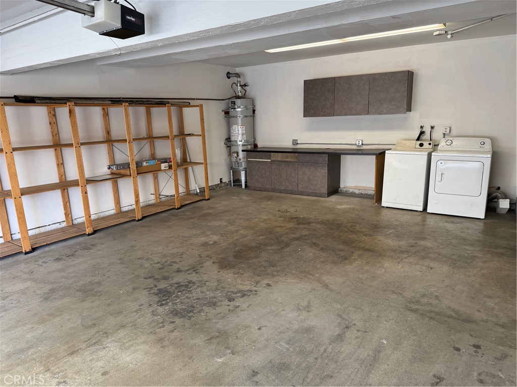 18419 Collins Street, Unit E Tarzana, CA 91356 - Photo 26 of 40 a view of an empty room with a fireplace and a window