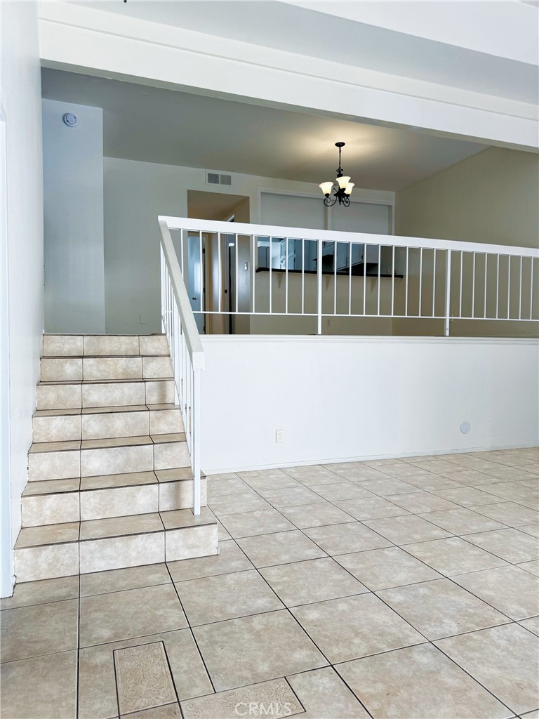 18419 Collins Street, Unit E Tarzana, CA 91356 - Photo 5 of 40 a view of entryway with a front door
