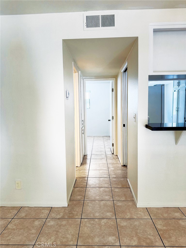 18419 Collins Street, Unit E Tarzana, CA 91356 - Photo 7 of 40 a view of a hallway