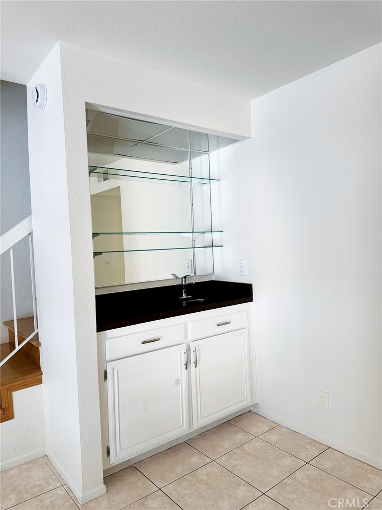 18419 Collins Street, Unit E Tarzana, CA 91356 - Photo 9 of 40 a utility room with dryer and washer