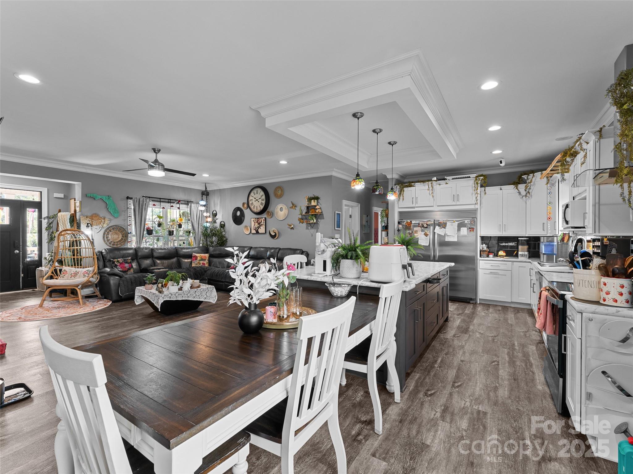 1154 North Ridge Road Hendersonville, NC 28792 - Photo 17 of 29 a view of a dining room kitchen with furniture and a kitchen view