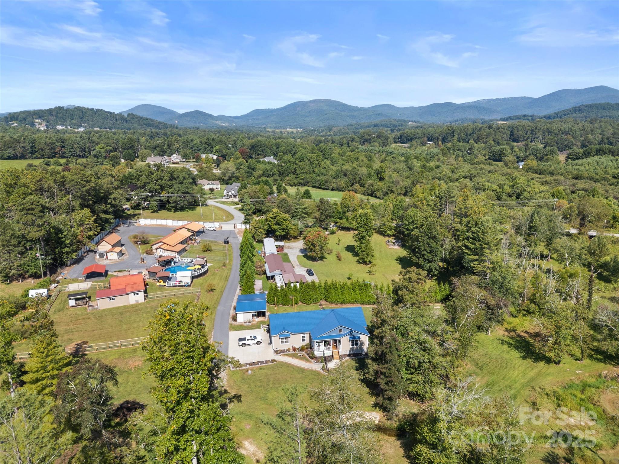 1154 North Ridge Road Hendersonville, NC 28792 - Photo 10 of 29 a view of a city with mountains in the background
