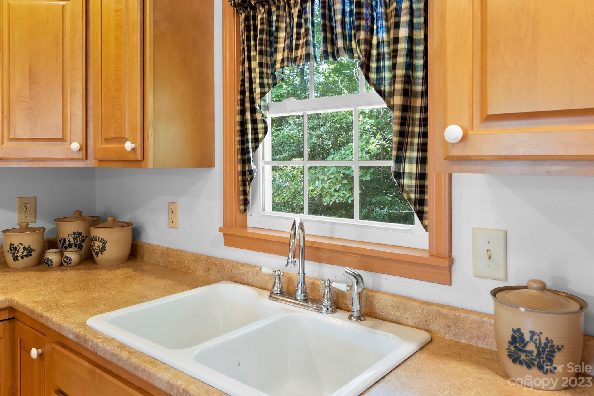 40 Autumn View Drive Hendersonville, NC 28792 - Photo 13 of 48 a bathroom with a sink and a window
