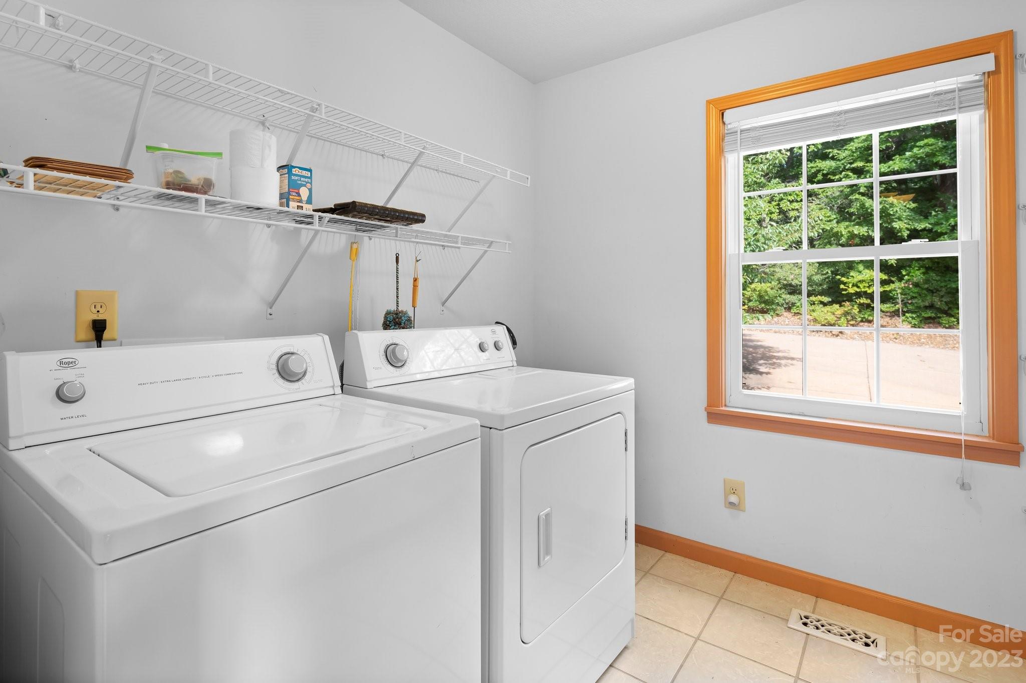 40 Autumn View Drive Hendersonville, NC 28792 - Photo 15 of 48 a utility room with dryer and washer