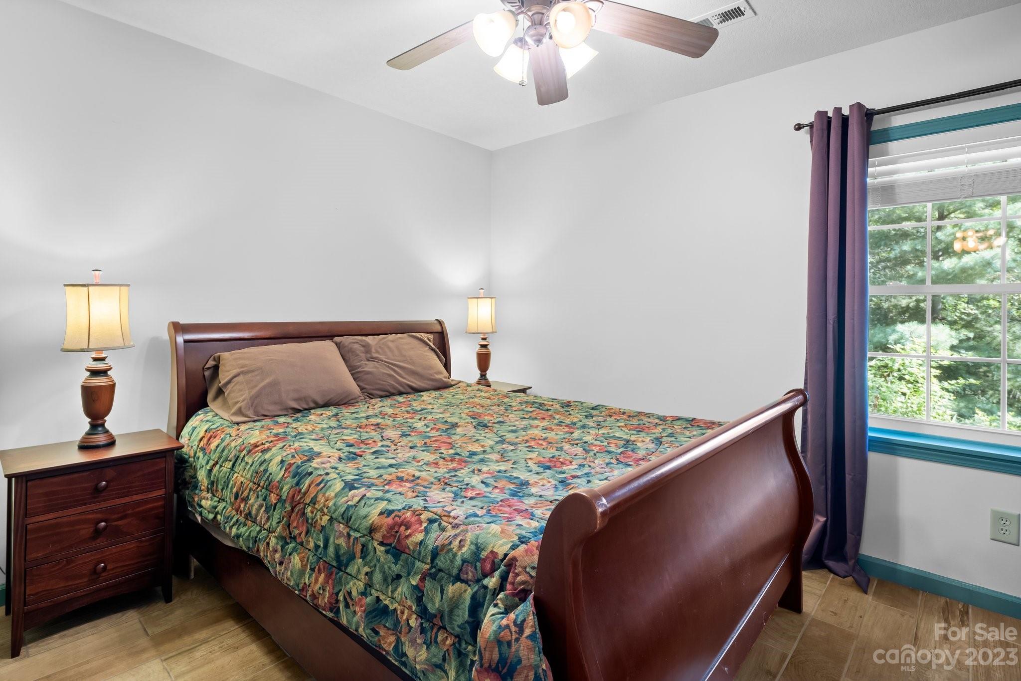 40 Autumn View Drive Hendersonville, NC 28792 - Photo 26 of 48 a bedroom with a bed and a window