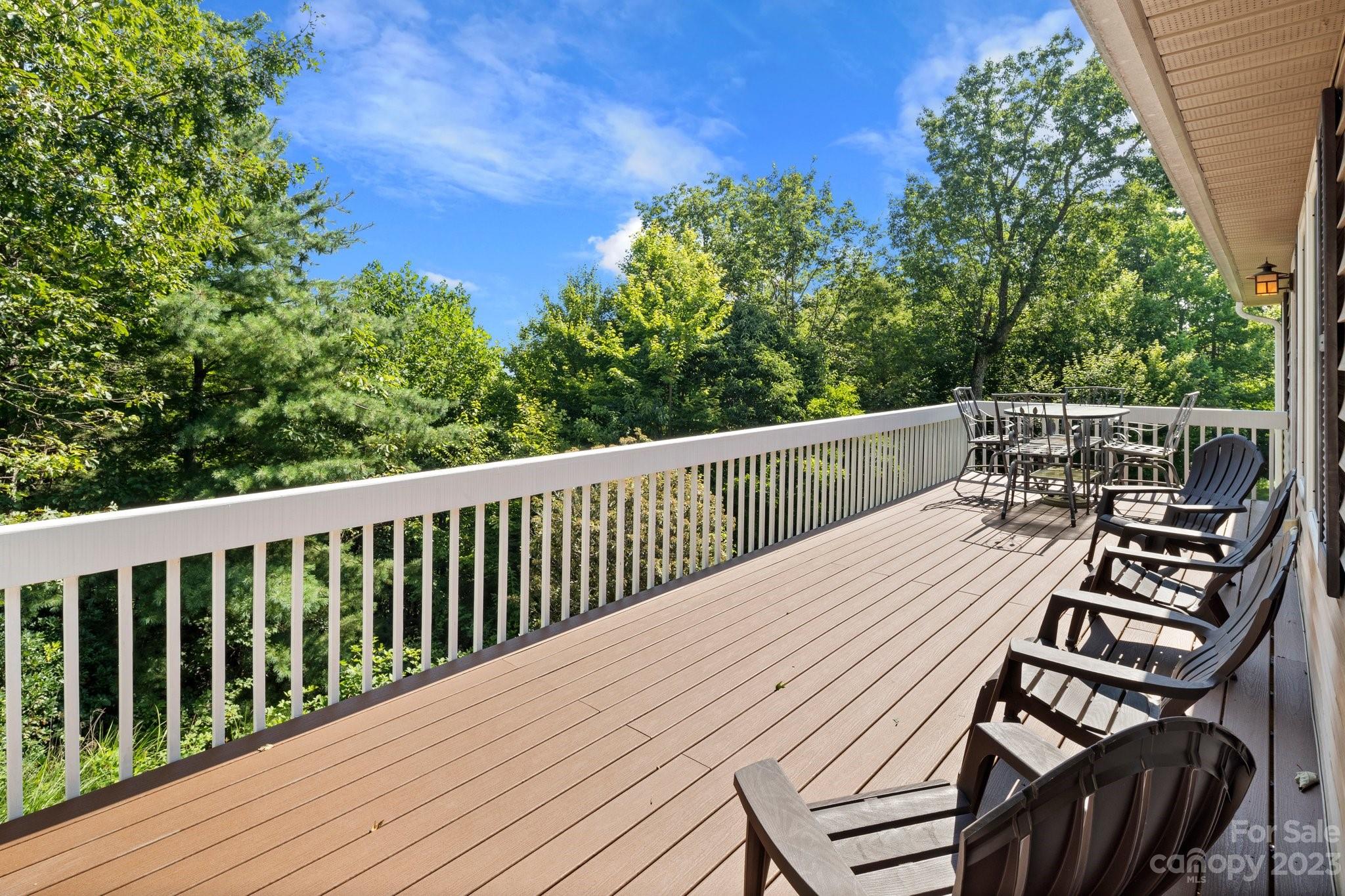 40 Autumn View Drive Hendersonville, NC 28792 - Photo 35 of 48 a view of a wooden deck with furniture