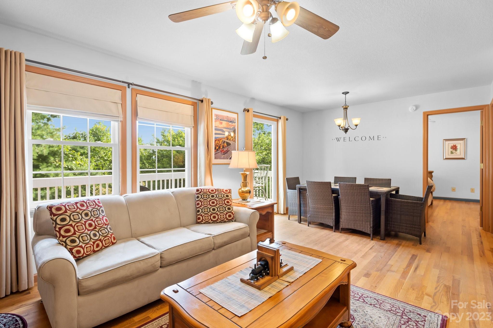 40 Autumn View Drive Hendersonville, NC 28792 - Photo 6 of 48 a living room with furniture and a large window
