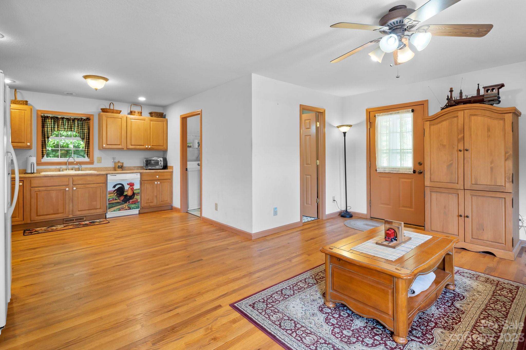 40 Autumn View Drive Hendersonville, NC 28792 - Photo 8 of 48 a living room with furniture and a open kitchen view
