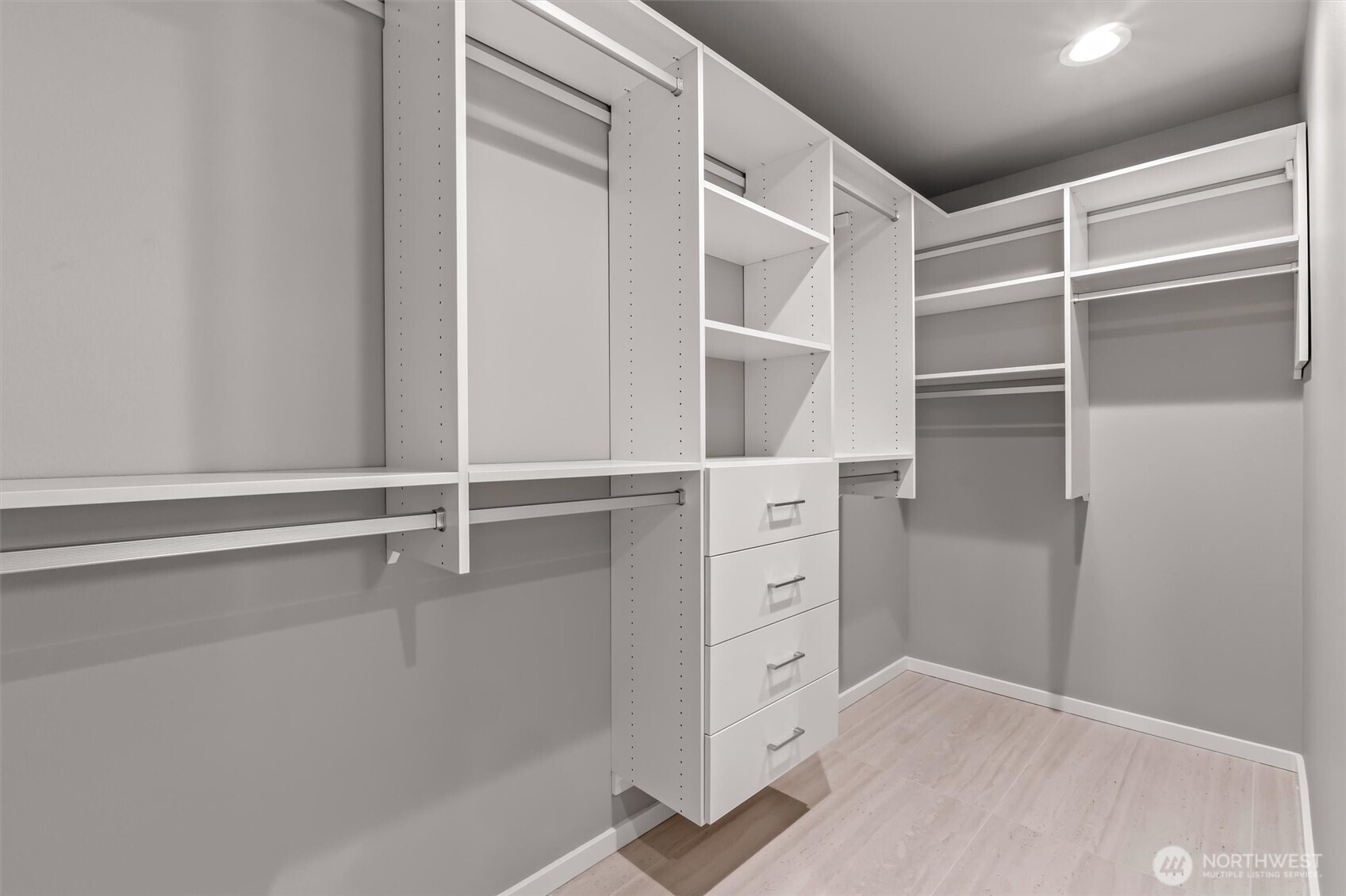4460 Midvale Avenue North Seattle, WA 98103 - Photo 22 of 40 a view of walk in closet with empty racks