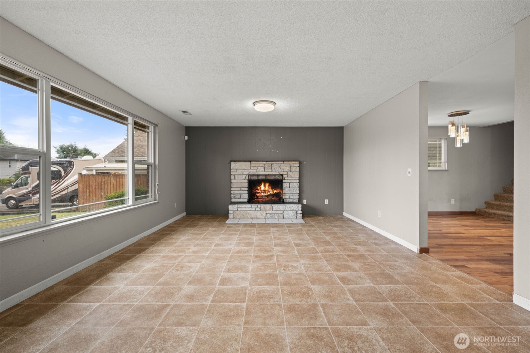 1209 Dundee Drive Cosmopolis, WA 98537 - Photo 15 of 40 a view of a livingroom with wooden floor and a window