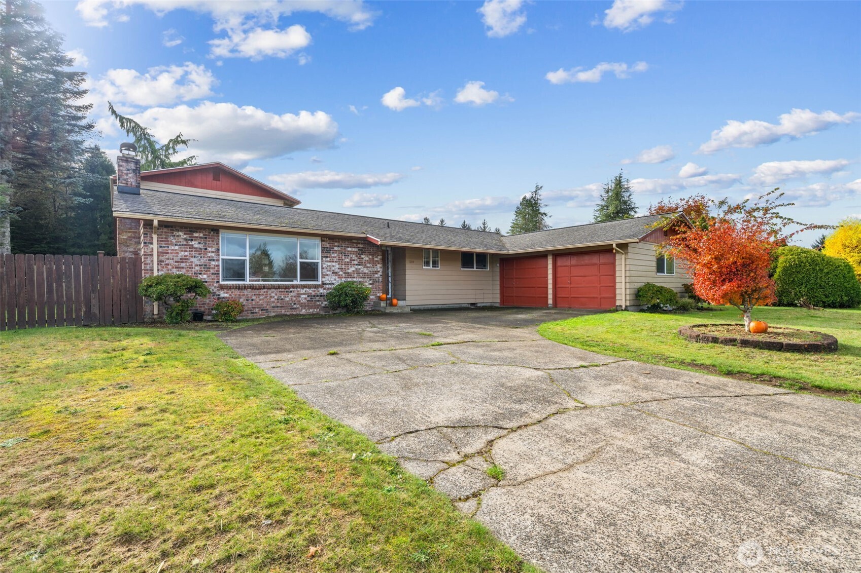 1209 Dundee Drive Cosmopolis, WA 98537 - Photo 2 of 40 a front view of a house with a yard and potted plants