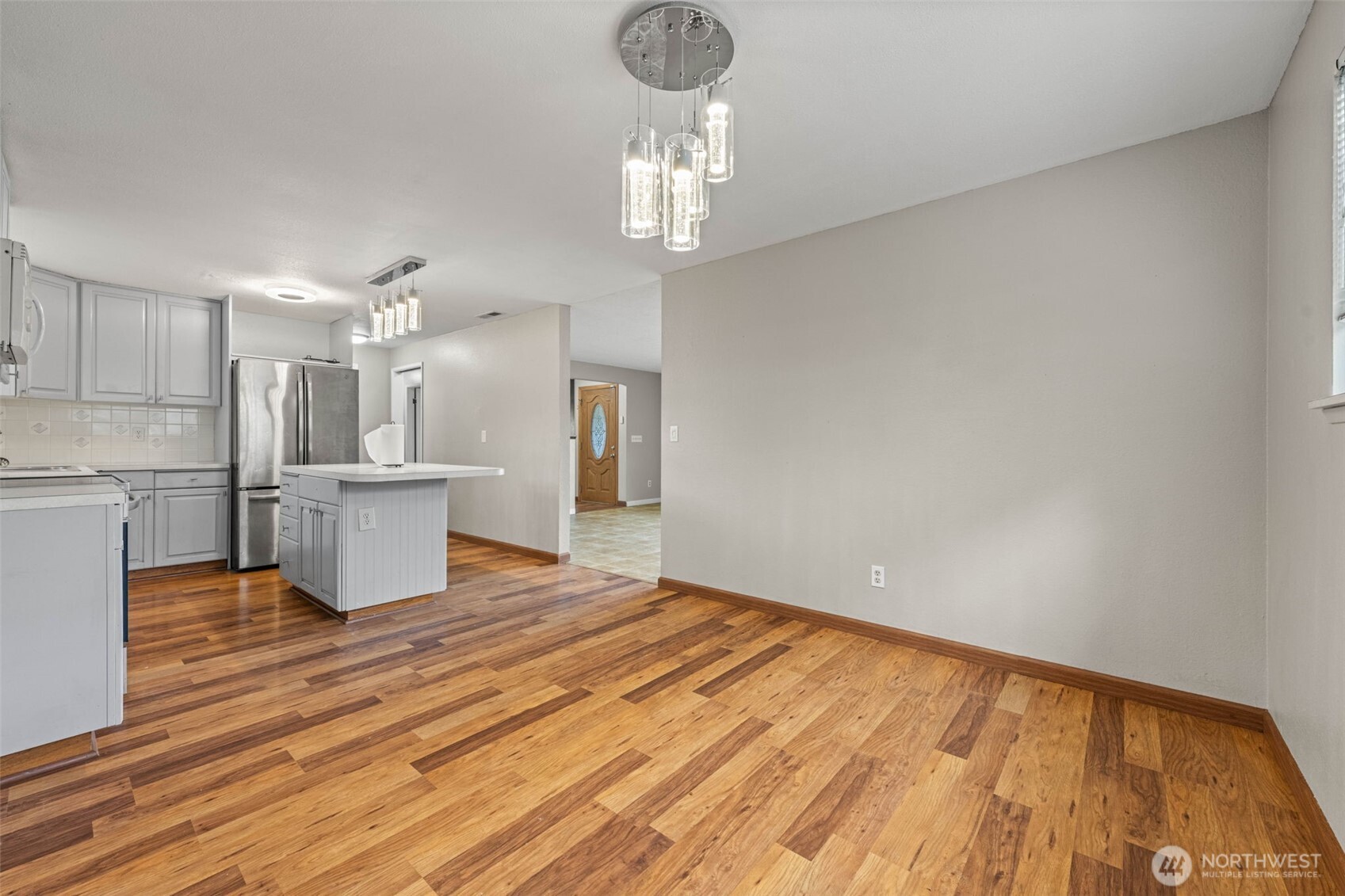 1209 Dundee Drive Cosmopolis, WA 98537 - Photo 26 of 40 a view of a kitchen with marble kitchen and refrigerator