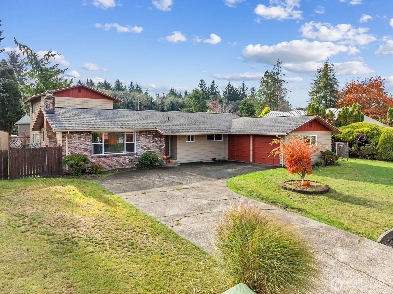 1209 Dundee Drive Cosmopolis, WA 98537 - Photo 37 of 40 a front view of a house with a yard table and chairs