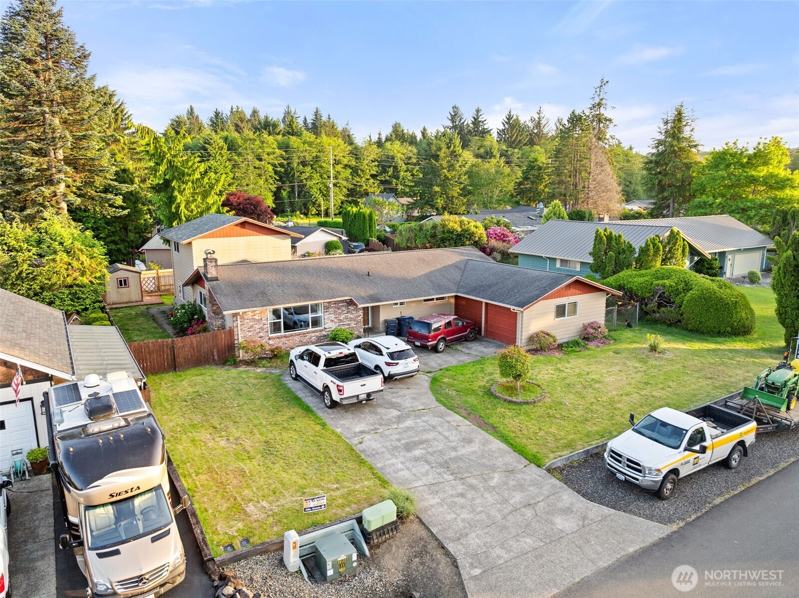 1209 Dundee Drive Cosmopolis, WA 98537 - Photo 39 of 40 an aerial view of a house with garden space and car parked