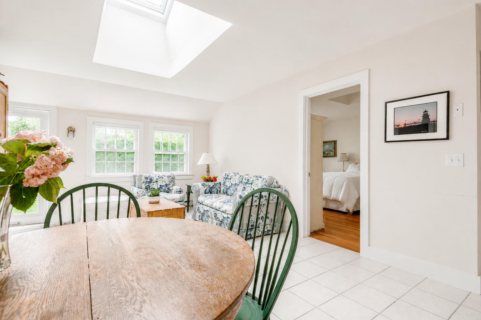 12 King Street Nantucket, MA 02554 - Photo 23 of 32 a bedroom with furniture and a chair