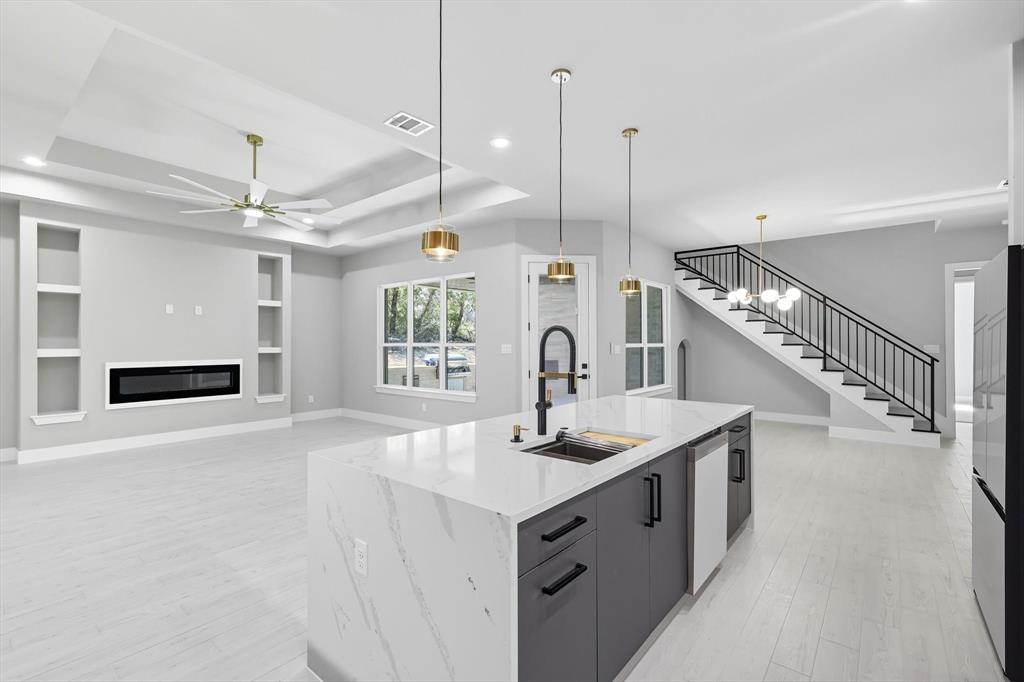 1040 Andy Ranch Azle, TX 76020 - Photo 12 of 33 a kitchen with counter top and stove