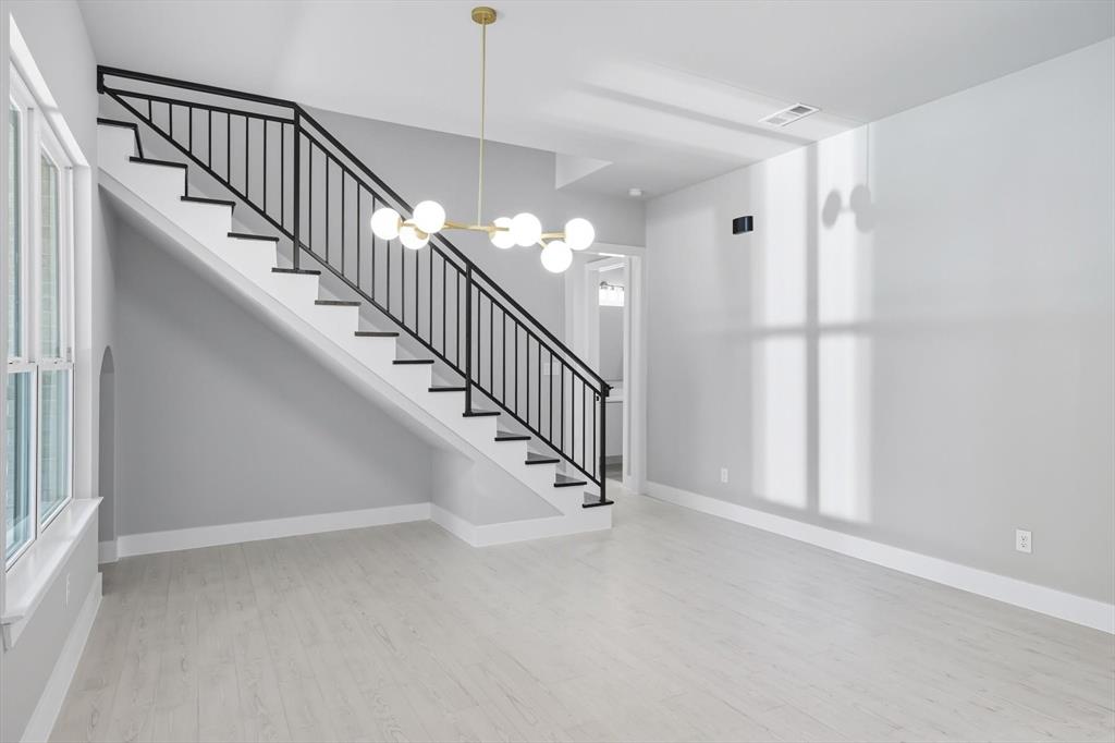 1040 Andy Ranch Azle, TX 76020 - Photo 17 of 33 a view of a hallway with staircase