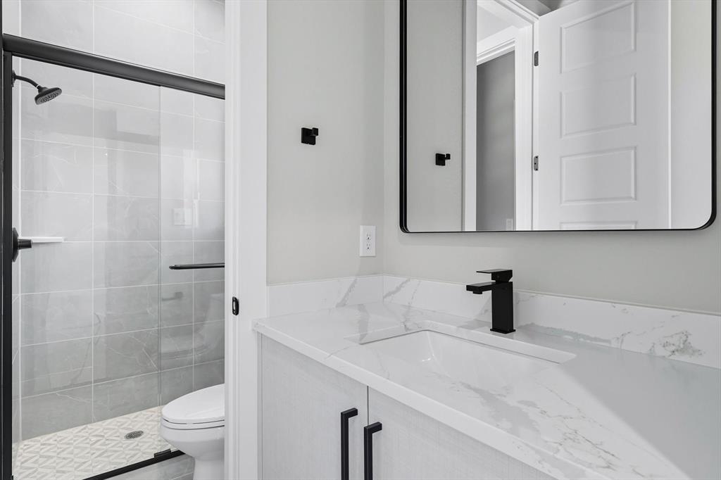 1040 Andy Ranch Azle, TX 76020 - Photo 26 of 33 a bathroom with a sink and a toilet