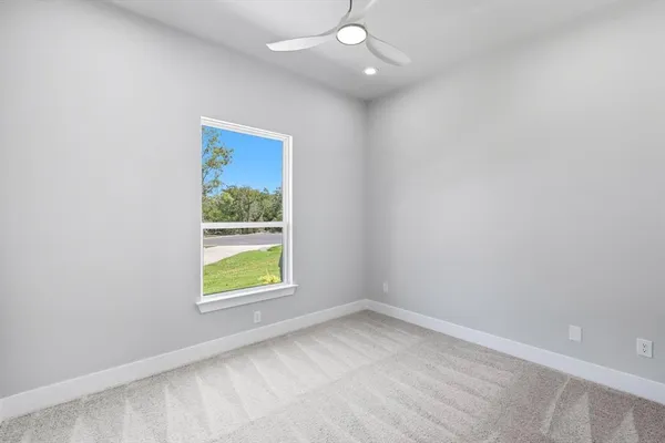 an empty room with window