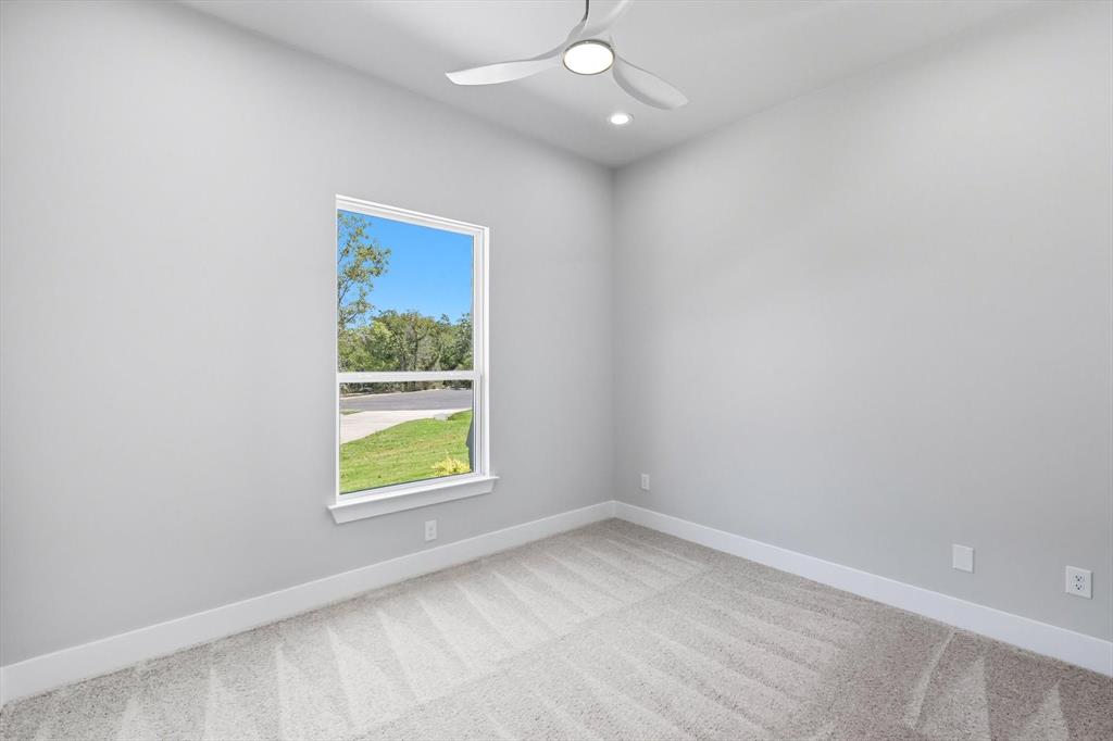 1040 Andy Ranch Azle, TX 76020 - Photo 27 of 33 an empty room with window