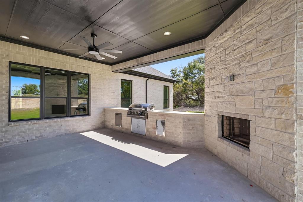 1040 Andy Ranch Azle, TX 76020 - Photo 30 of 33 a living room with furniture and a fireplace