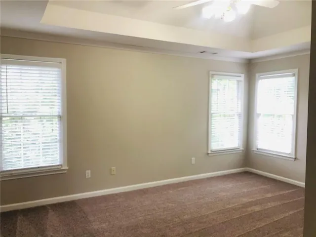 an empty room with closet area