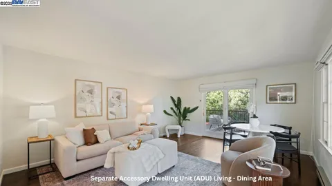 a bathroom with a toilet a sink and a window