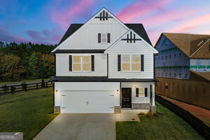 11149 Cornerstone Lane Hampton, GA 30228 - Photo 1 of 29 a view of a big house with a big yard and large trees