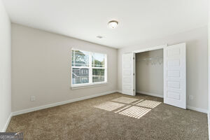 11149 Cornerstone Lane Hampton, GA 30228 - Photo 20 of 29 a view of an empty room with a window