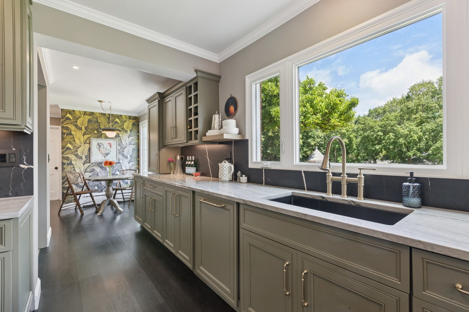 60 Ridge Road Barrington Hills, IL 60010 - Photo 27 of 70 a open kitchen with stainless steel appliances granite countertop a sink a stove and a wooden floors