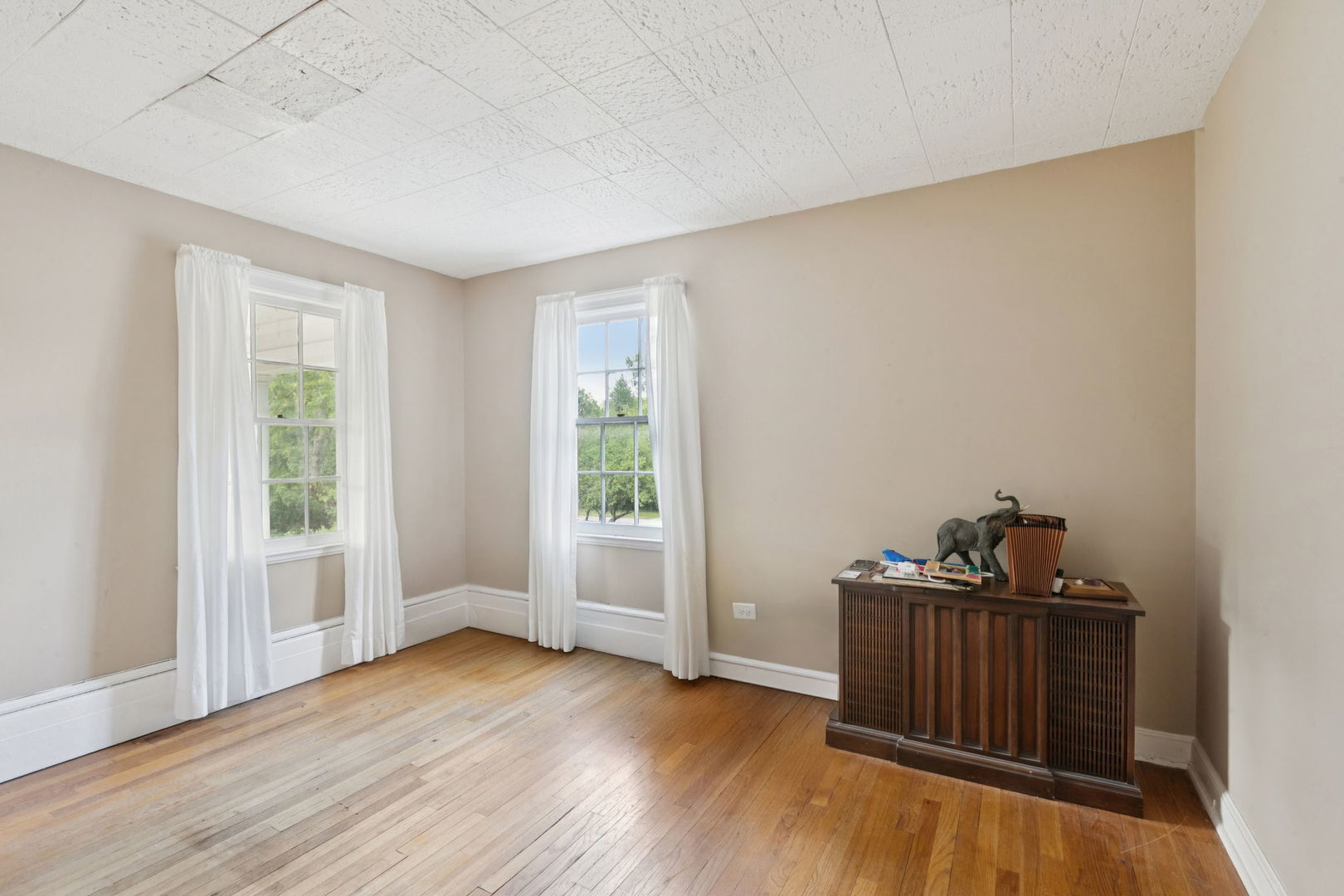 60 Ridge Road Barrington Hills, IL 60010 - Photo 44 of 70 an empty room with wooden floor and windows