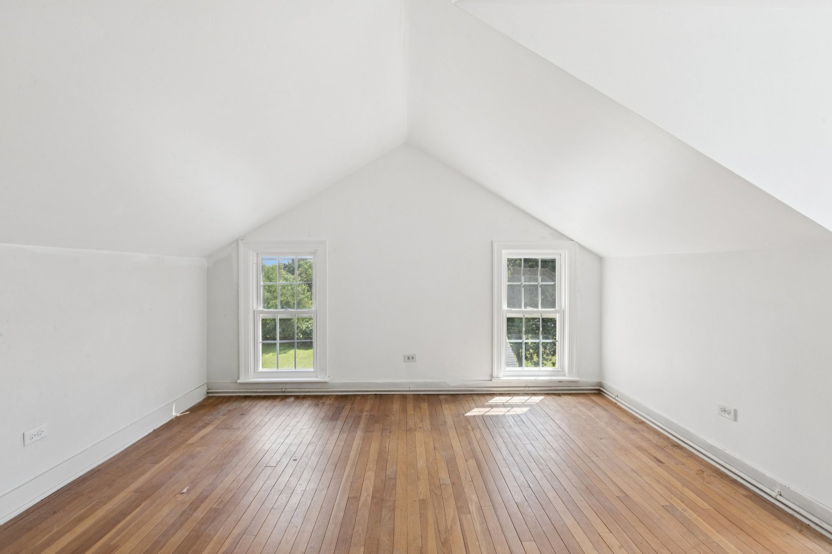 60 Ridge Road Barrington Hills, IL 60010 - Photo 48 of 70 an empty room with wooden floor and windows