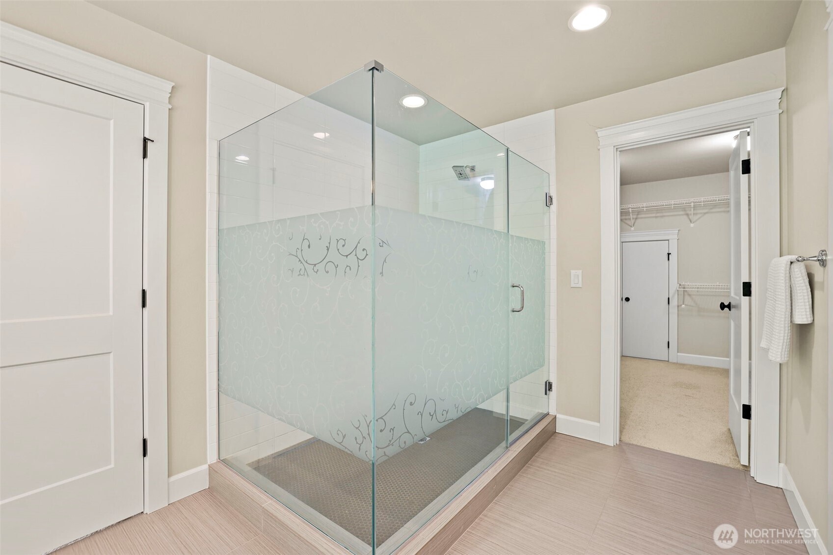 29 242nd Street Southeast Bothell, WA 98021 - Photo 20 of 40 a bathroom with a shower and a glass door