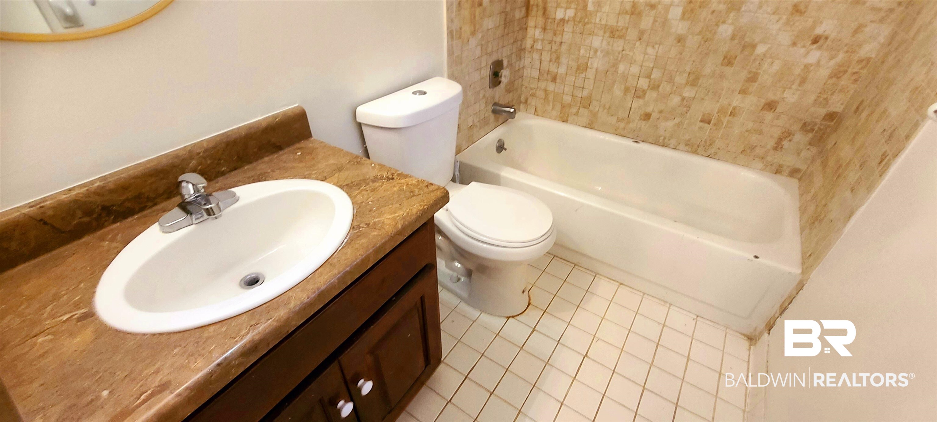 5305 Wilhelm Drive Mobile, AL 36618 - Photo 12 of 16 Bathroom featuring toilet, tile patterned flooring, and vanity