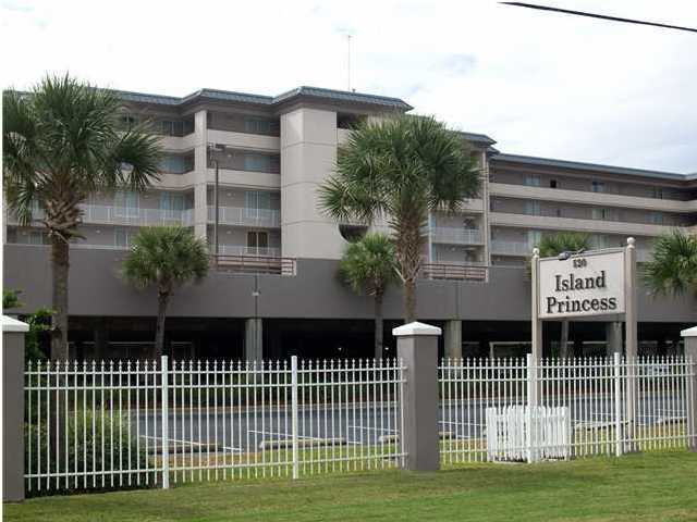 520 Santa Rosa Boulevard, Unit 110 Fort Walton Beach, FL 32548 - Photo 1 of 21 a front view of a house with a garden