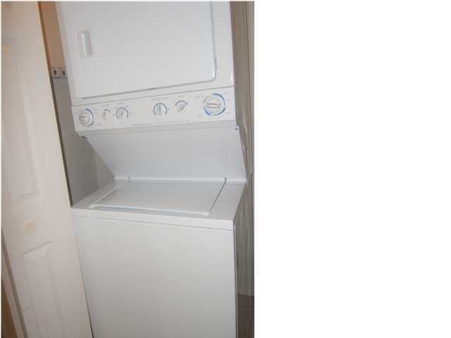 520 Santa Rosa Boulevard, Unit 110 Fort Walton Beach, FL 32548 - Photo 14 of 21 a close up view of washer and dryer