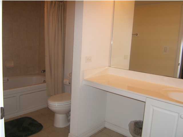 520 Santa Rosa Boulevard, Unit 110 Fort Walton Beach, FL 32548 - Photo 9 of 21 a bathroom with a toilet and a bathtub