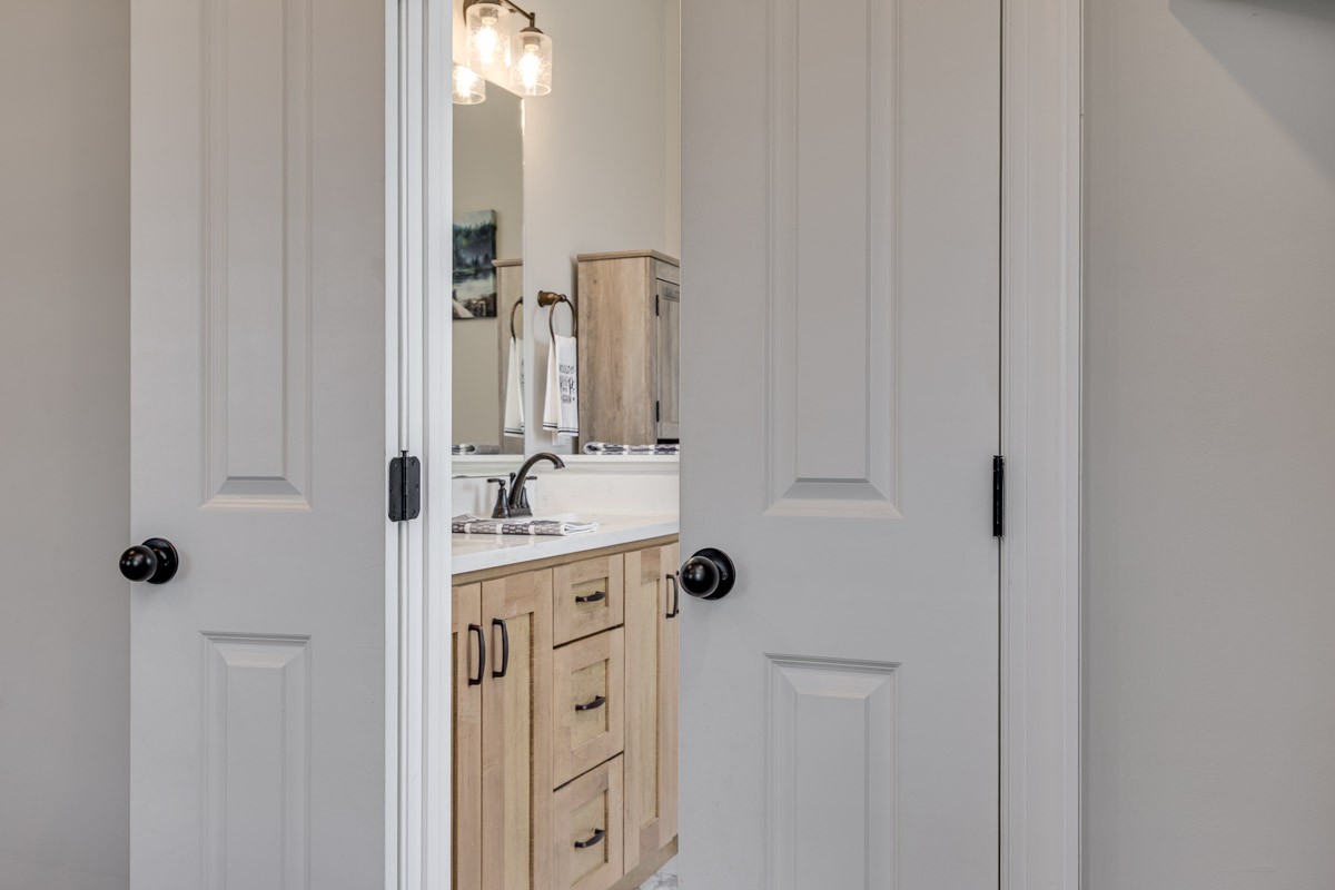 2743 West County Farm Road Springfield, TN 37172 - Photo 24 of 53 a bathroom with a sink vanity and a mirror