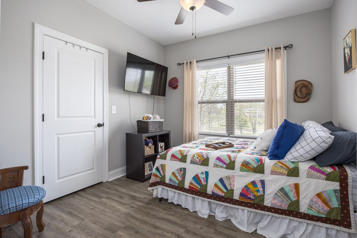 2743 West County Farm Road Springfield, TN 37172 - Photo 29 of 53 a bedroom with a bed a window and dresser
