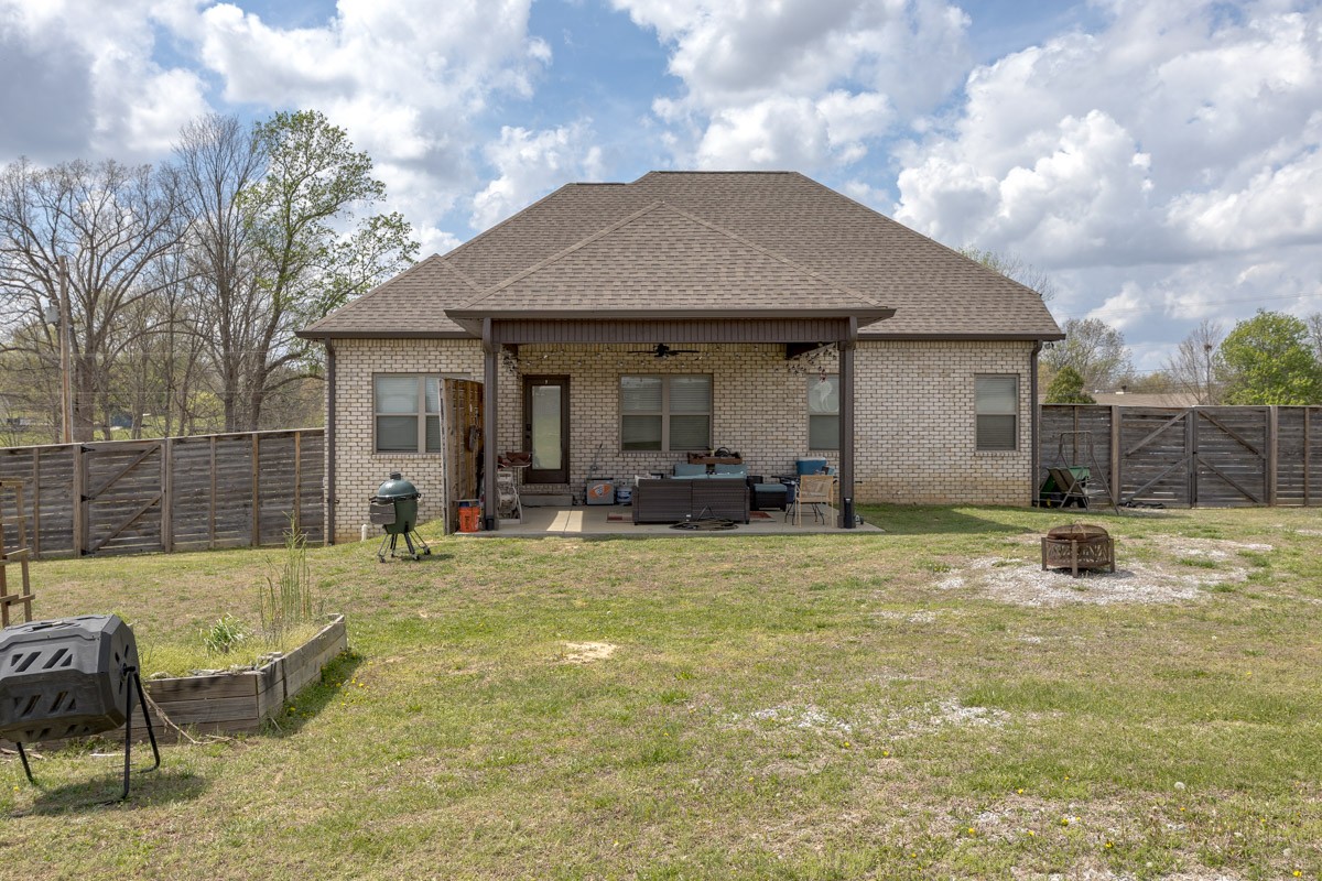 2743 West County Farm Road Springfield, TN 37172 - Photo 44 of 53 a backyard of a house with table and chairs