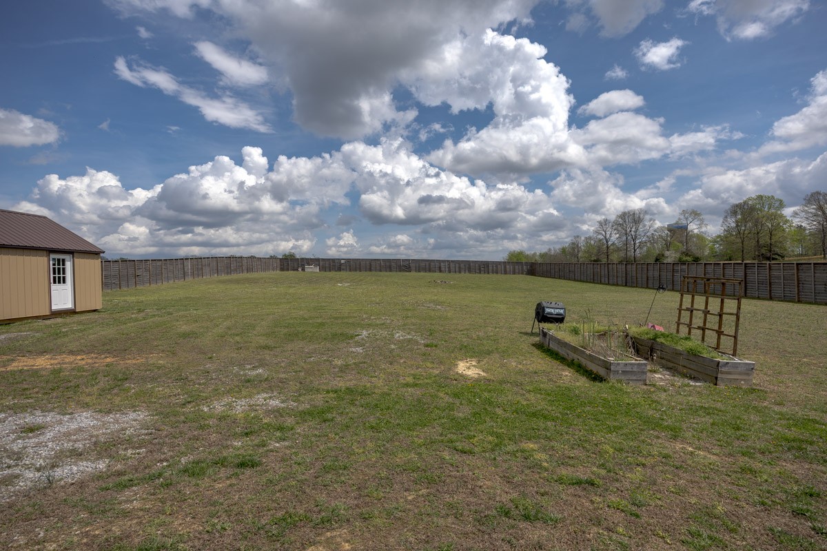 2743 West County Farm Road Springfield, TN 37172 - Photo 47 of 53 a view of a golf course with a lake