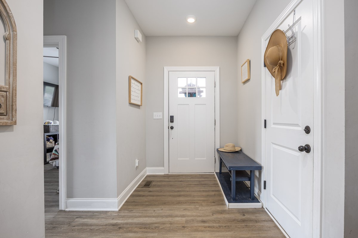 2743 West County Farm Road Springfield, TN 37172 - Photo 9 of 53 a view of a hallway with wooden floor and entryway