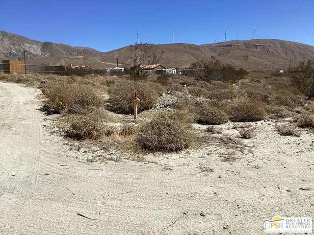 a view of mountains and snow