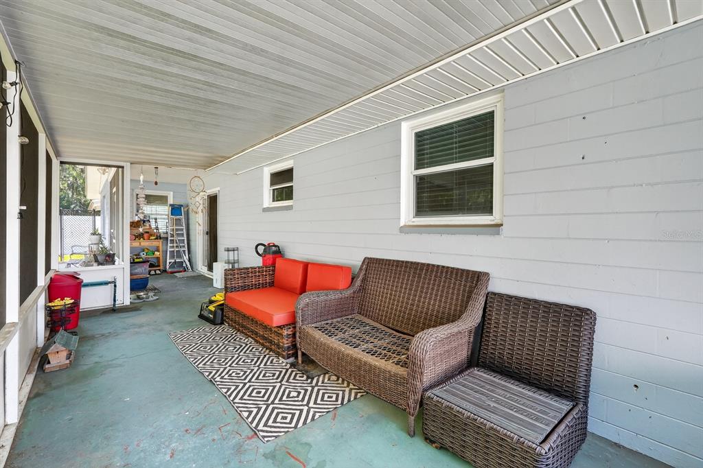 327 London Road Daytona Beach, FL 32117 - Photo 19 of 42 a building outdoor space with patio furniture