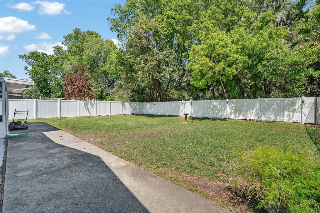 327 London Road Daytona Beach, FL 32117 - Photo 21 of 42 a view of a backyard