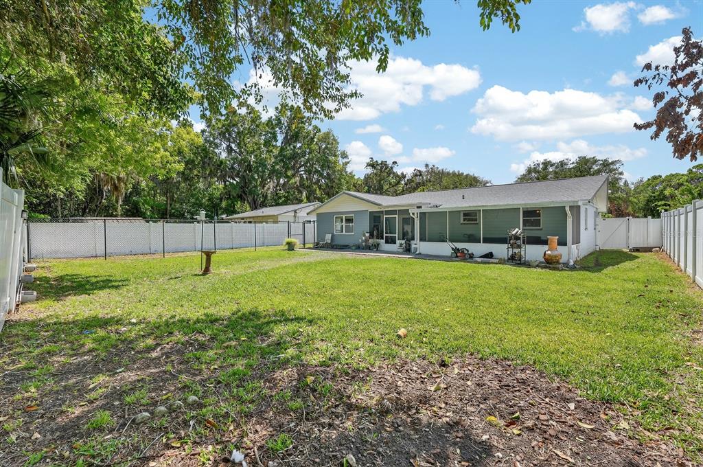 327 London Road Daytona Beach, FL 32117 - Photo 23 of 42 a house view with a garden space