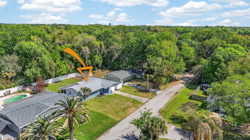 327 London Road Daytona Beach, FL 32117 - Photo 33 of 42 an aerial view of a house with a garden and lake view
