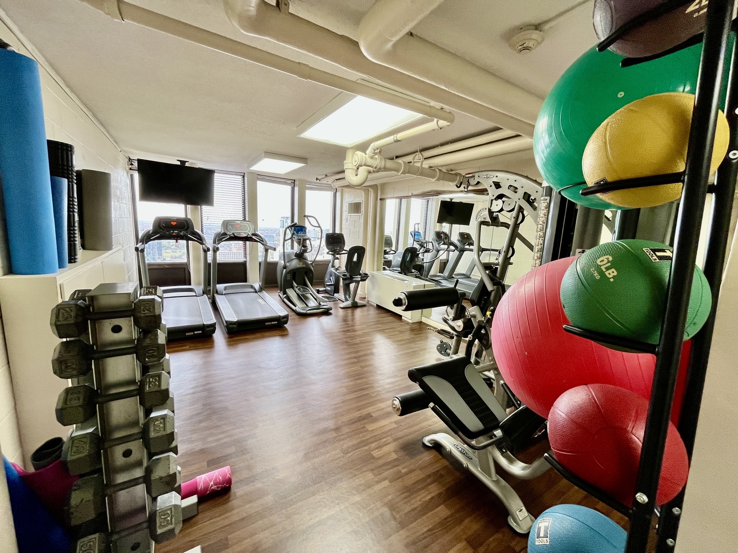 100 East Walton Place, Unit 14A Chicago, IL 60611 - Photo 15 of 19 a living room with furniture and a large window