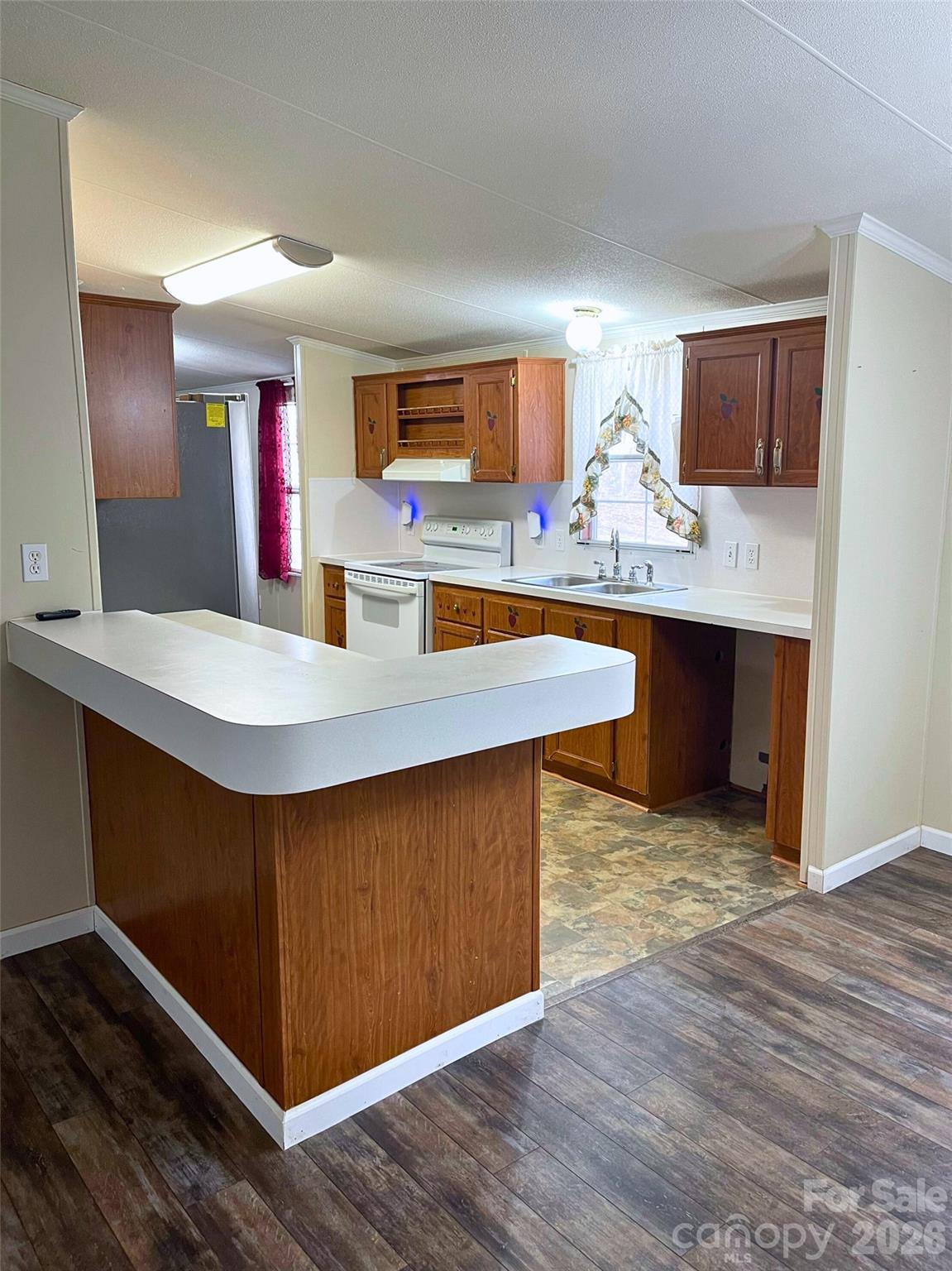 205 Star Road York, SC 29745 - Photo 4 of 15 a kitchen with stainless steel appliances granite countertop a sink and stove
